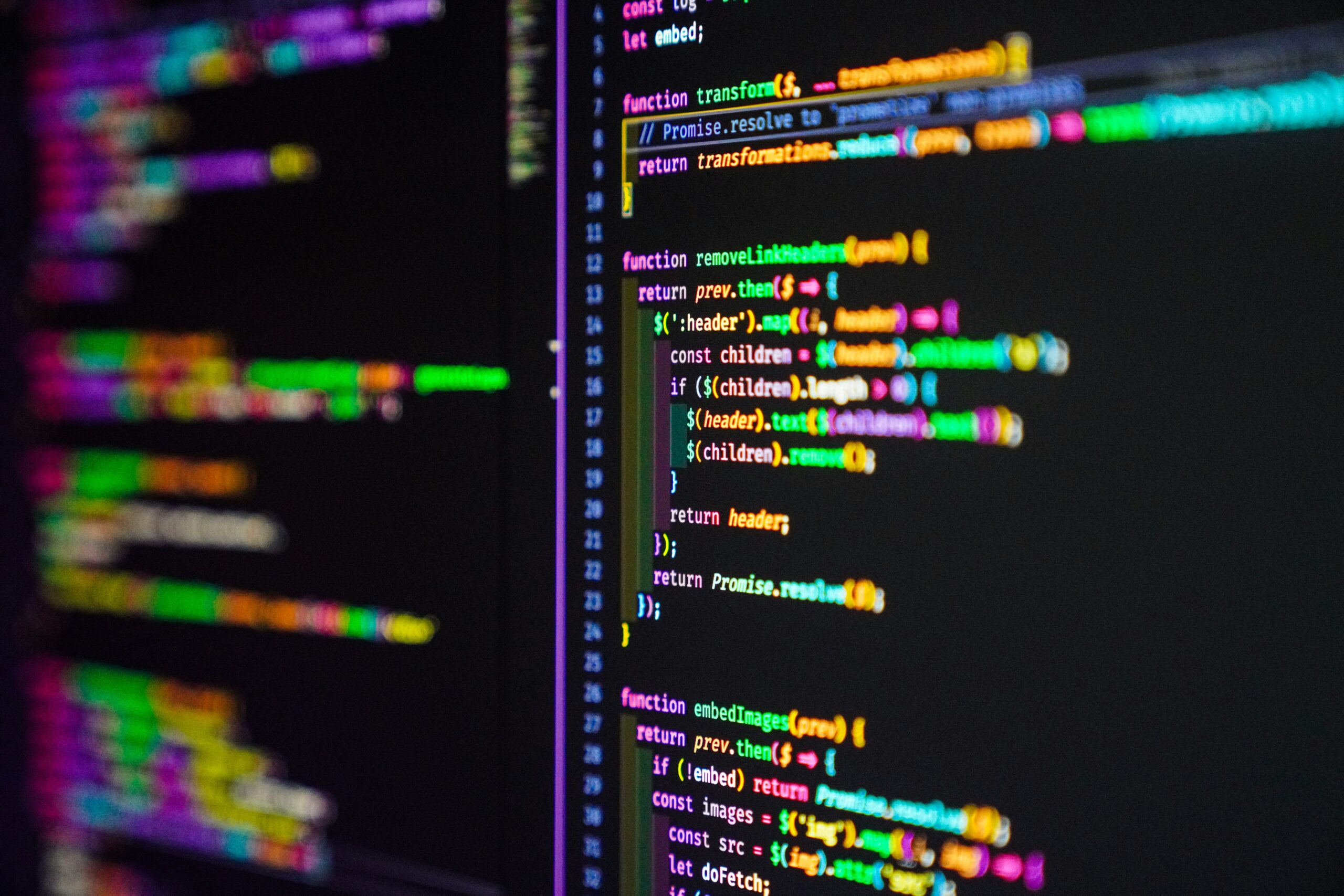Screen showing lines of colorful programming code
